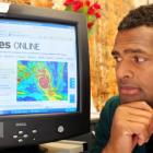 Student Eric Nabalagi checks the latest Cyclone Tomas reports coming from Fiji yesterday. Photo b...