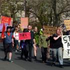 Students and activists march on the University of Otago campus yesterday in protest against the...