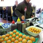 Students Sarah Whalan (left) and Greg Giles order at the Union Cafe yesterday, which could be...