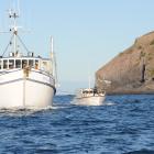 University of Otago research vessel Polaris II tows Summer Wine back to Port Chalmers past...