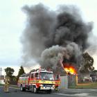 Sunday's fire in Johnson St took 10 firefighters two hours to contain. Photo by Gerry Hunt