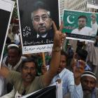 Supporters of former president Pervez Musharraf chant slogans on Sunday in Karachi, during a...