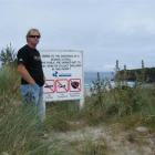 Surfer Graham Carse has been waiting since 1991 to have the sewage problem at Tomahawk Beach...