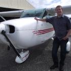 Sven Thelning with the North Otago Aero Club's Cessna 172 at Oamaru Airport. Photo by Sally Rae.