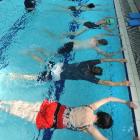 Swimming New Zealand's Chris Morgan instructs Dunedin primary school teachers at Moana Pool on...