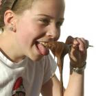 Tabitha Seaton, of Dunedin, is safe licking chocolate icing off the spoon, but beware flour-based...