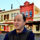 Tai Ping owner Henry Chin outside his fire-damaged restaurant yesterday. Photos by Peter McIntosh.