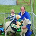 Taieri A&P Show president Kelly Allison and son Fynn (4) examine one of this year's entrants....