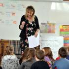 Taieri Beach School principal Liz Bishop and her pupils look forward to having their classroom...