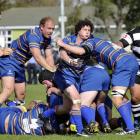 Taieri halfback Ryan Hammer clears to his backs during the premier rugby game against Southern at...