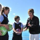 Taieri Plains Junior Netball secretary Jules Clunie (second from right) shares umpiring tips with...