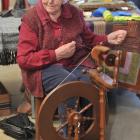 Sue Lloyd, of Taieri Creative Fibre, spins yarn.