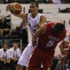 Tall Black Craig Bradshaw clashes with Lebanon's Jackson Vroman during a Fiba World Basketball...