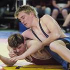 Taranaki's Keiran Hussey gets the upper hand over Elliot Thomas, of Canterbury, in a 76kg bout in...