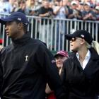 Target of jokes . . . Tiger Woods and his wife Elin.   (AP Photo/Alastair Grant, File)