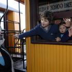 Tarn Thomlinson (6) waves good-bye to his mother Kjesten Nilsson, of Portobello, as Russell...