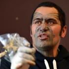 Tauranga ta moko artist Stu McDonald takes a break from working on Kees Meeuws at a Ta Moko...