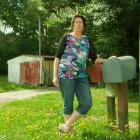 Teacher Sarah Roberts outside her family farm. Photo by Chris Morris.