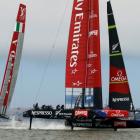 Team New Zealand (R) takes the lead against Italy's Luna Rossa approaching the windward mark...