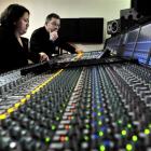 Technicians Stephen Stedman and Lou Kewene operate the desk at the NZMiC Albany St studio.Photo...