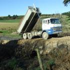 Temporary access to Bull Creek while the main access road is repaired will be over farmland via...