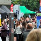 Tertiary students throng among the information marquees  at the Otago Museum Reserve in Dunedin...