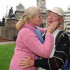 Tessa and Frans Visser, of Holland, kiss and cuddle in the Octagon yesterday during their tour of...