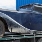 The 1922 Rolls-Royce Silver Ghost belonging to Michael Swann is trailered to a secure location...