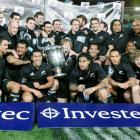 The All Blacks celebrate after winning their Tri-Nations-Bledisloe Cup clash against the...