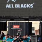 The All Blacks go into a huddle during the captain's run at Carisbrook yesterday. Photo by Craig...