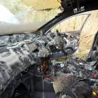 The burnt-out interior of a car in Highcliff Rd, Sandymount, yesterday afternoon. Photos by...