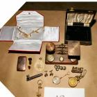 The collection of antique jewellery, pocket watches, cufflinks and scales recovered by police at...