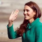 The Duchess of Cambridge waves after arriving with Prince William at Hamilton airport before...
