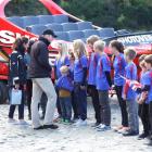 The Duke and Duchess of Cambridge chat to Arrowtown Primary School children on Shotover Beach...