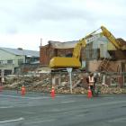 The former Clutha County Council building in Balclutha is demolished yesterday afternoon. Photo...