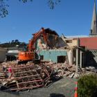 The former Donald Beasley Institute is  demolished in Dunedin yesterday. Photo by Gerard O'Brien.