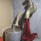 The giant papier-mache tap and burgundy cloth above tanks in Mount Edward's winery, made by...