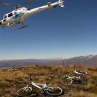 The helicopter that brought us up Crown Peak with our bikes departs for Queenstown Airport....
