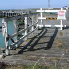 The historic Sumpter Wharf at Oamaru Harbour, closed to the public because of its dangerous state...