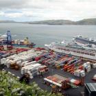 The <i> Oluf Maersk </i> (left)  begins unloading on Saturday morning, with the cruise ships <i>...