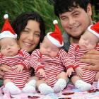 The Kelly triplets, Haylee Joanne, Charlotte Grace and Olivia Jean, with their mother Michelle...