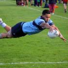 The King's No 8 stretches out to score in the second half.