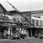 The last of the old facade being removed in 1975.