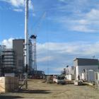 The major crane (centre) is coming down at the new Oceania dairy plant near Glenavy, heralding an...