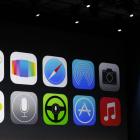 The new Apple iOS 7 features are displayed on screen  at Apple's  developers' conference in San...