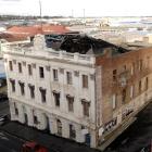 The new owners of the Stavely Building, on the corner of Bond and Jetty Sts, Dunedin, will...