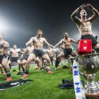The New Zealand team does the haka to celebrate winning the final of the 2011 Wellington Sevens...