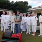The newly arrived greenkeeper at the Waikouaiti Bowling club, Russell Jenkinson (front), with...