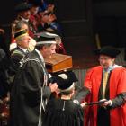 The next University of Otago chancellor, John Ward, caps current chancellor Lindsay Brown with an...
