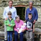 The oldest and youngest at the Hart family  reunion at Lawrence. Back, from  left, Michael Hart ...